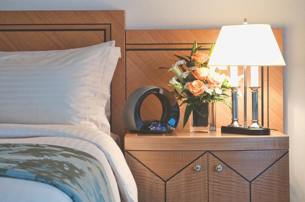 Wiseman Grand Hotel Doha Extérieur photo A bedside table