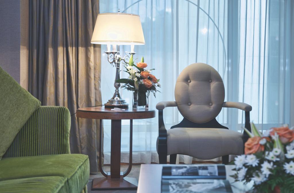 Wiseman Grand Hotel Doha Extérieur photo A living room at the hotel