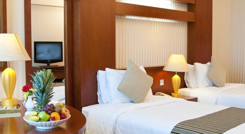 Wiseman Grand Hotel Doha Extérieur photo A room at the hotel